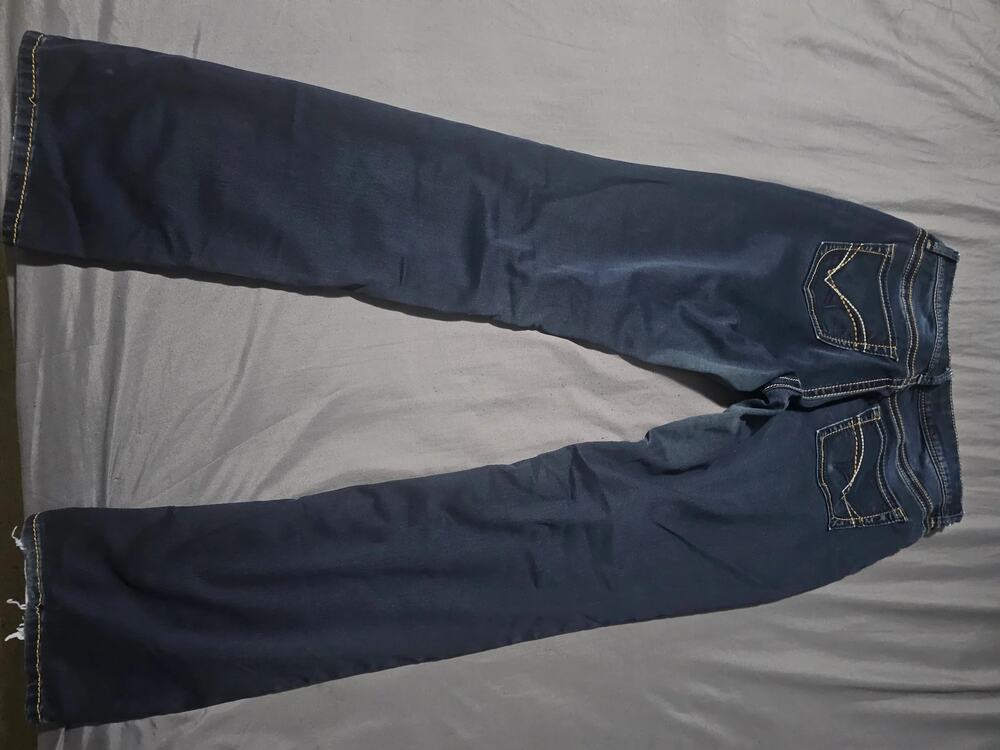 Dark wash denim jeans with contrast stitching